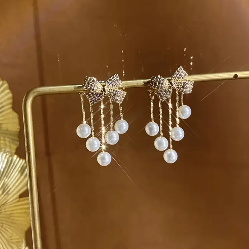 Pearl Cascade Bow Earrings - Image 3